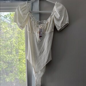 Elegant White Puff Sleeve Bodysuit